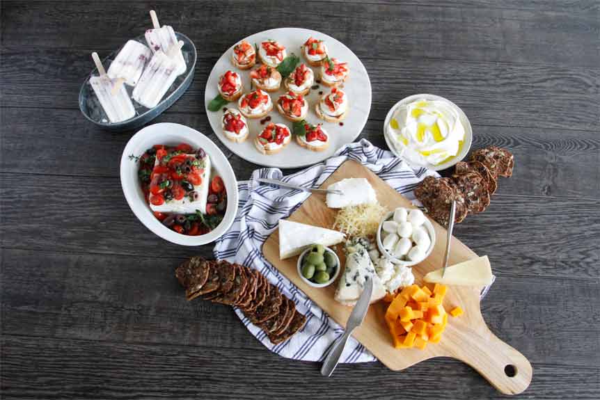 A bird eye view of assorted cheeses.