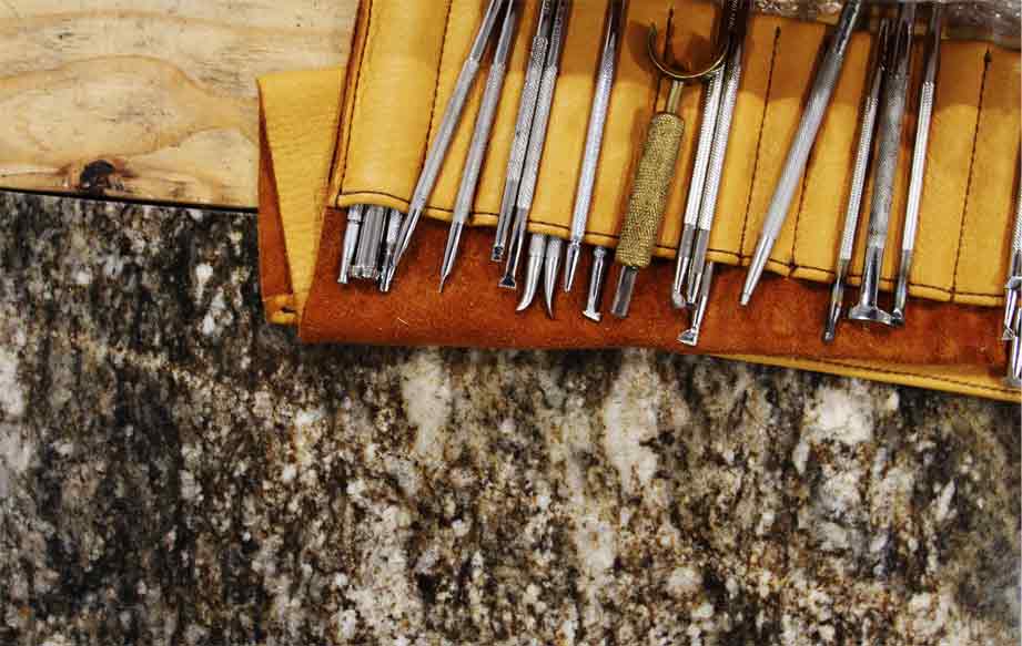 Small tools sitting on a counter.